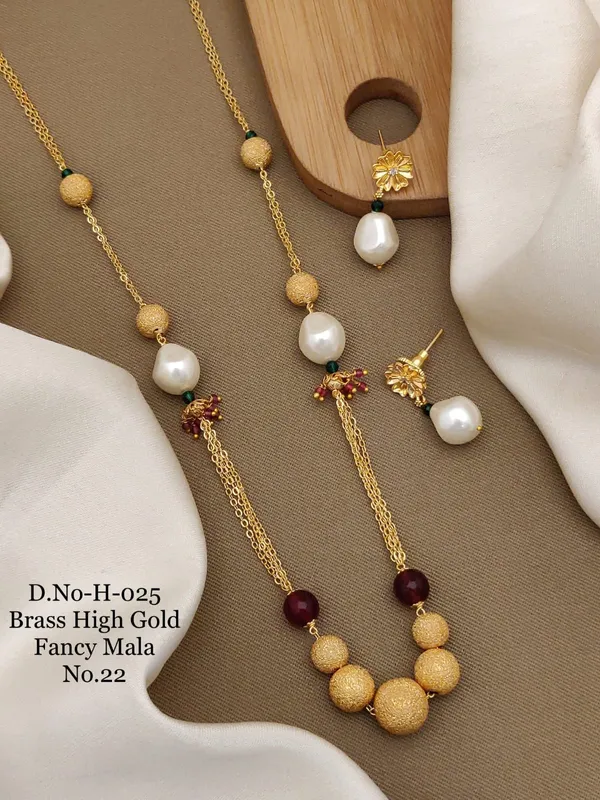 https://d1311wbk6unapo.cloudfront.net/NushopCatalogue/tr:f-webp,w-600,fo-auto/D.No-H-025 Brass High Gold Fancy Moti Mala_1689666234080_i5dm2bb2ijw6k3r.jpg__Ketmera